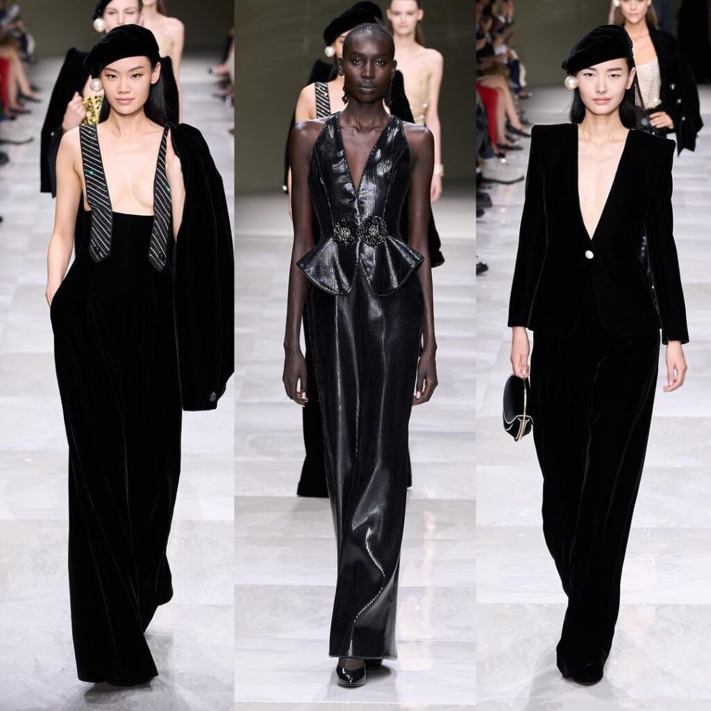 Modelos desfilam coleção de pérolas Giorgio Armani na passarela vestidos pretos. 